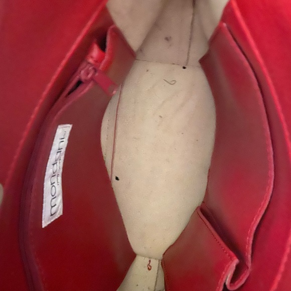 Red hand bag that is adorable.  Made from leather like material. - Picture 3 of 4